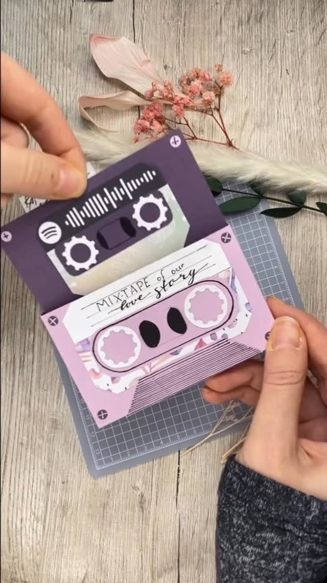 Handmade purple cassette tape card with the words mixtape of our love story