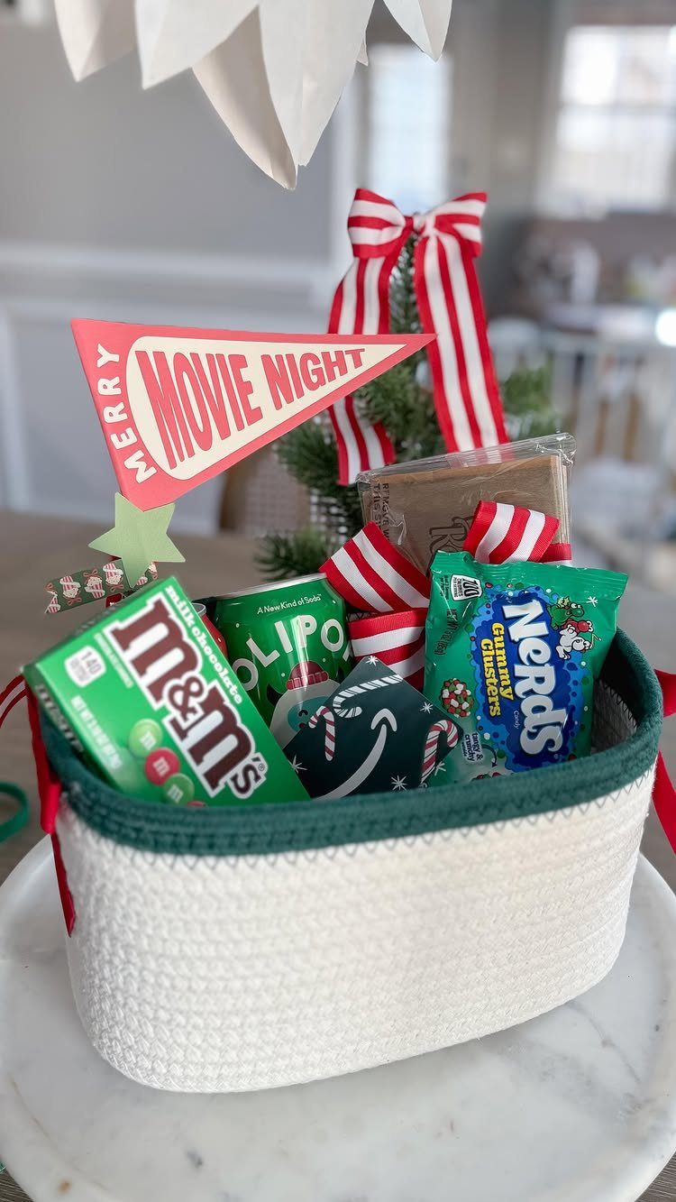 Movie night gift basket with candies and a red Merry Movie Night flag.