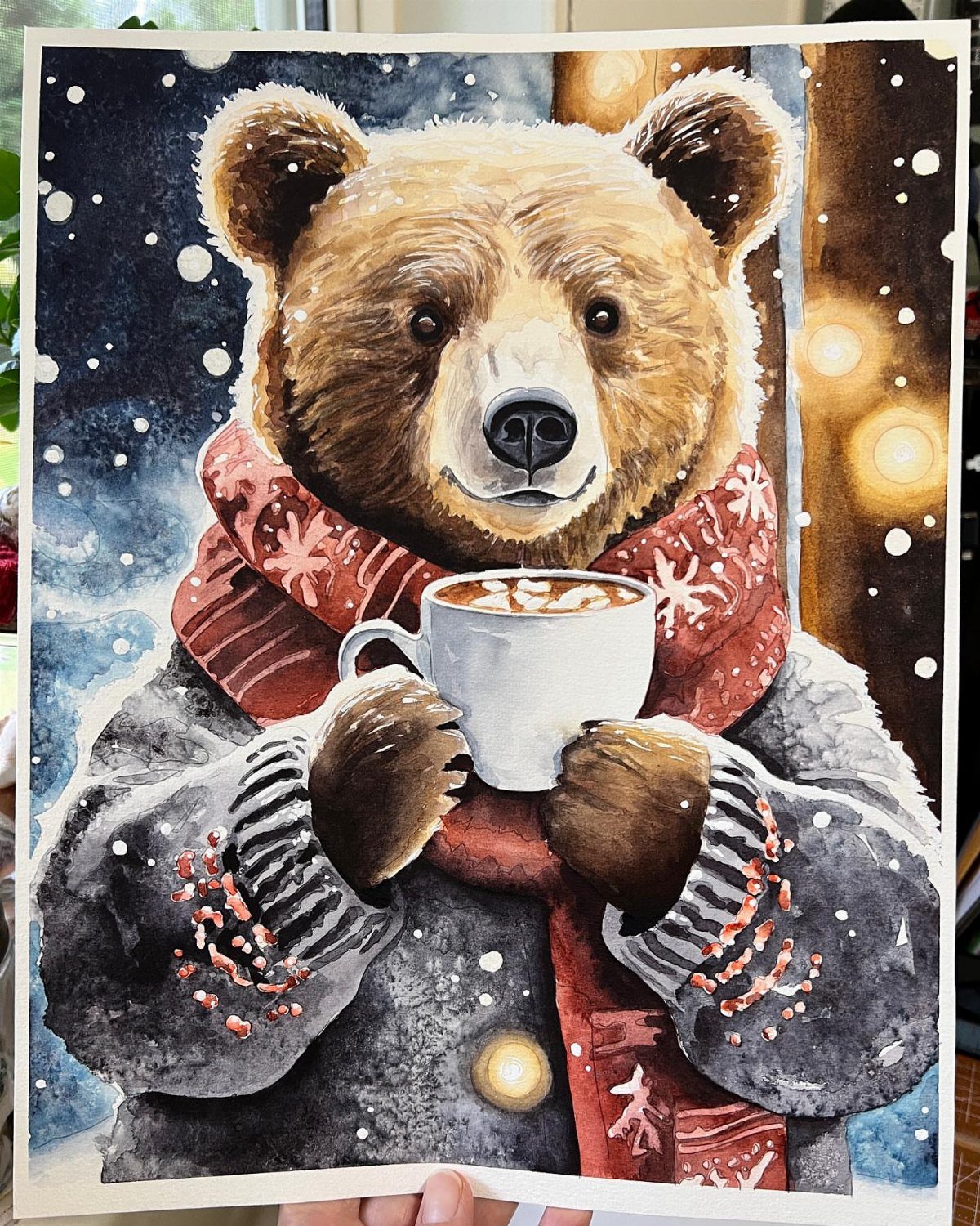 Art print of a cozy brown bear holding hot cocoa in the snow