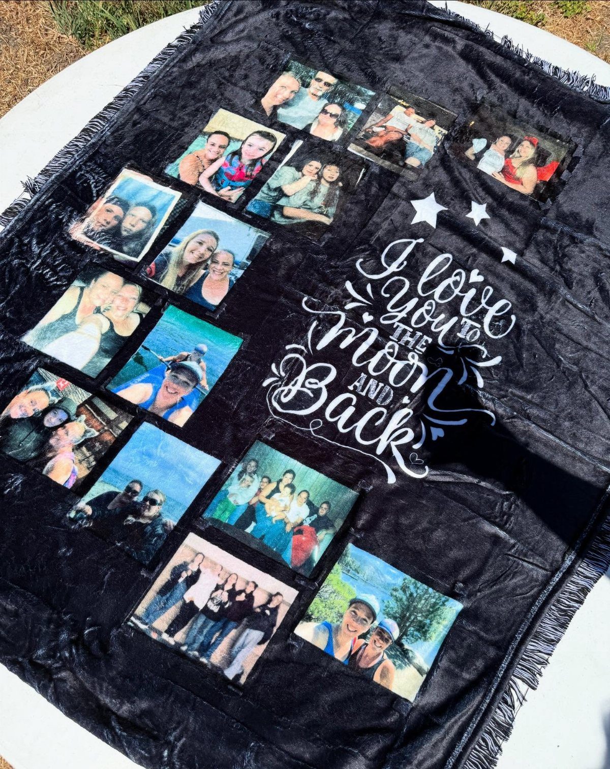 Black plush photo blanket with a collage of pictures and romantic white text.