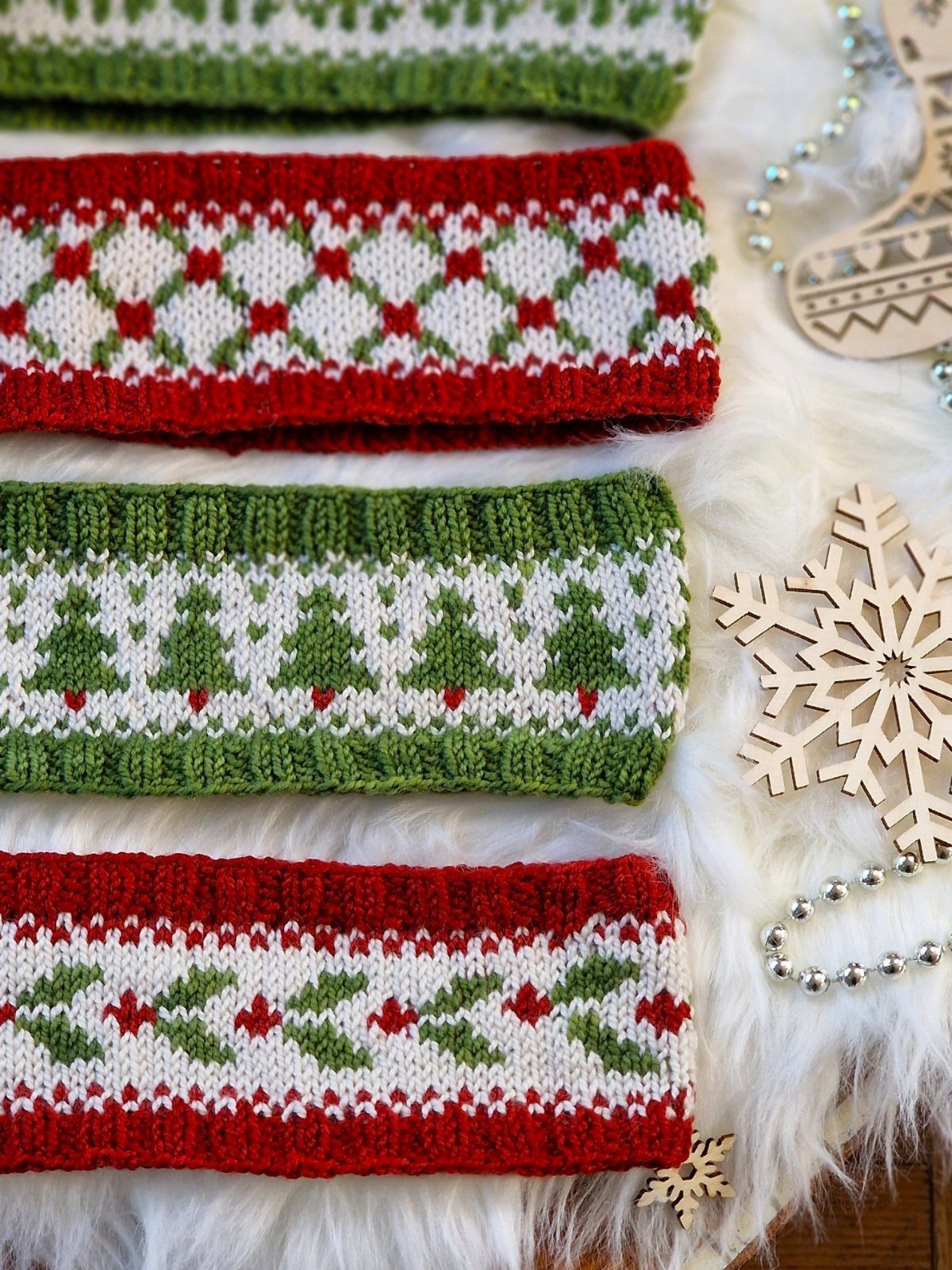 Knitted red and green holiday headbands with festive patterns on white faux fur.