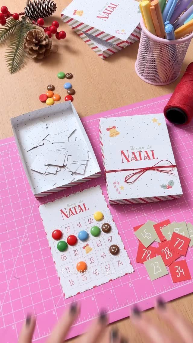 Holiday bingo card with colorful candy markers and a matching gift box.