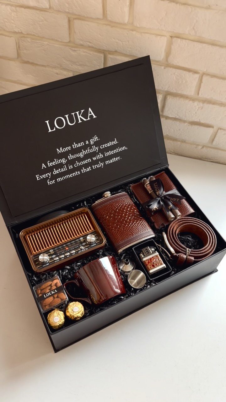 Brown themed gift set in a black box with radio, wallet, and belt.