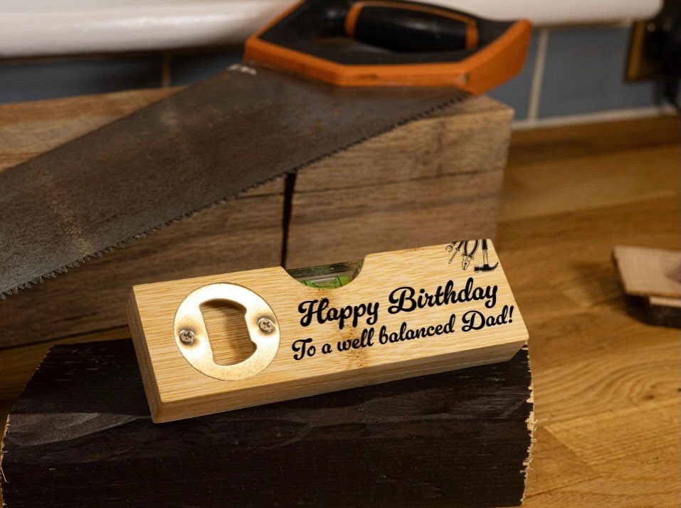Wooden birthday gift for dad with a bottle opener and spirit level.