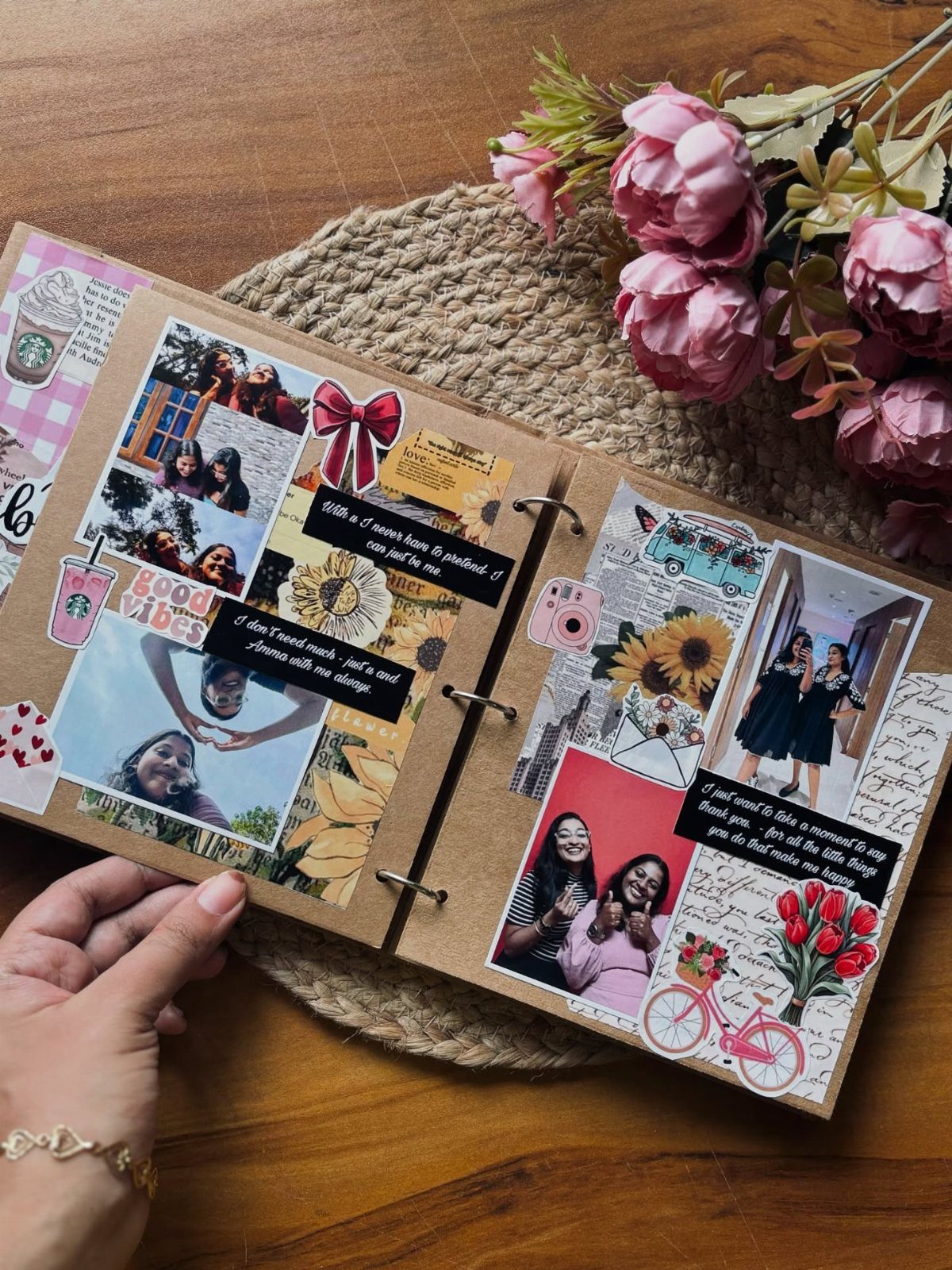 Handmade photo album with pictures of friends, stickers, and notes on wooden table