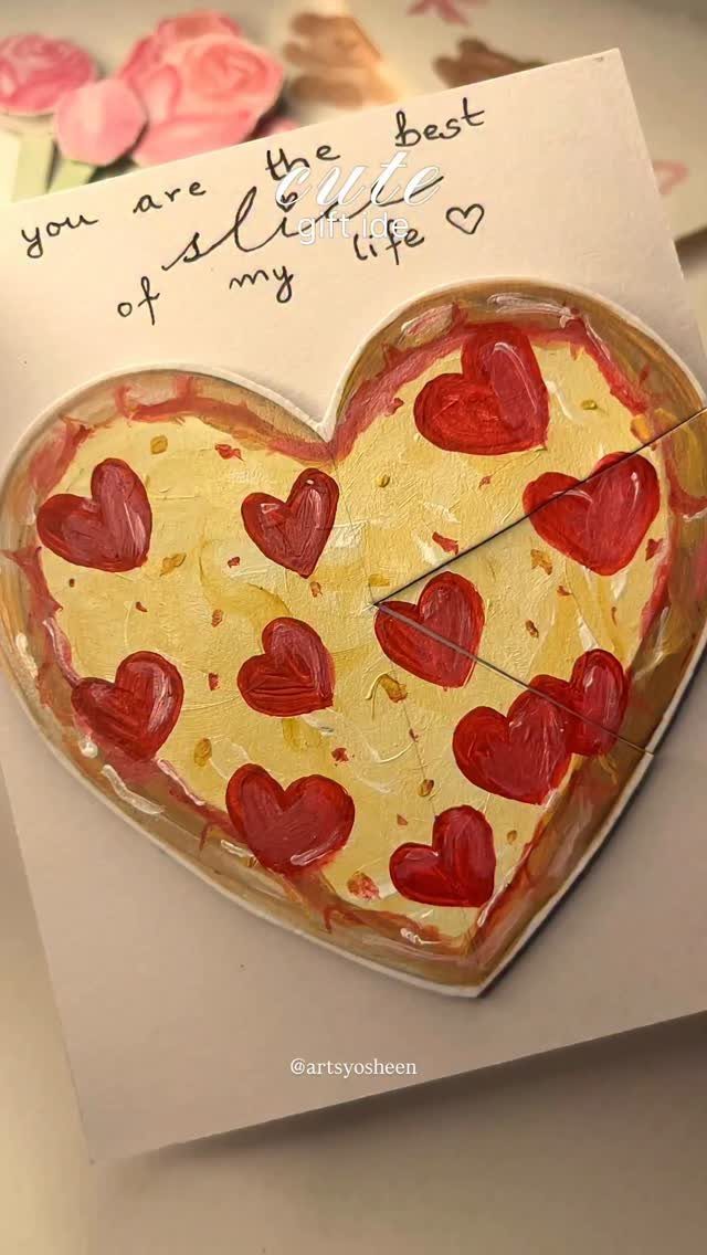 Handmade heart-shaped pizza card with red heart pepperonis and romantic handwritten text.