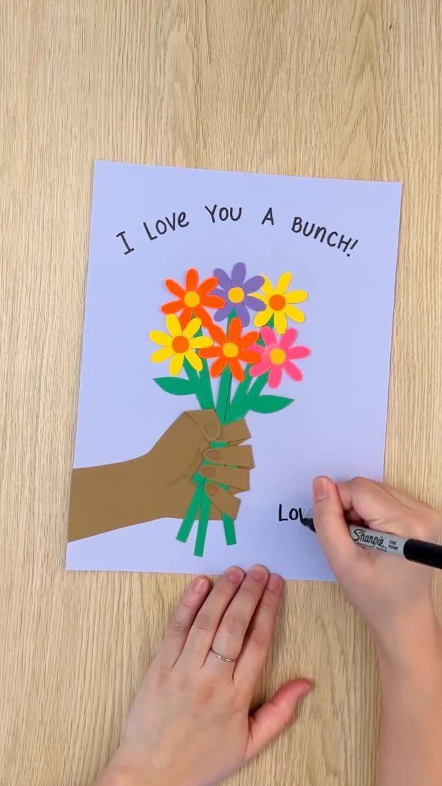 Handmade purple card with a colorful paper flower bouquet and heartfelt message.