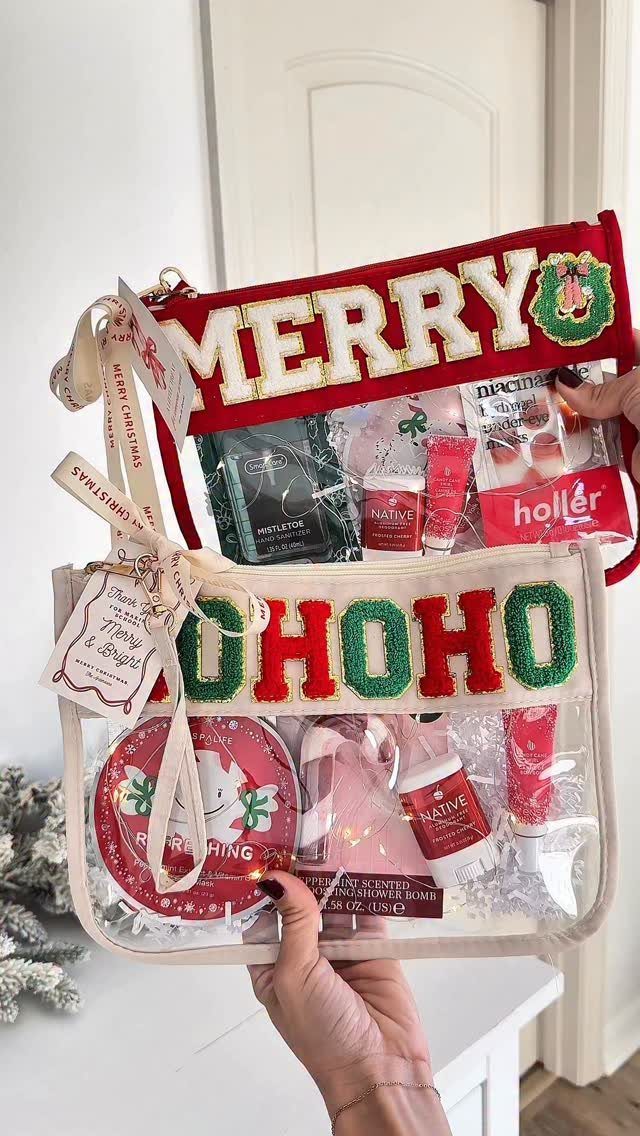 Two clear holiday gift pouches filled with bath products and festive treats.