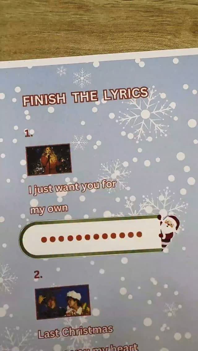 Printed Christmas party game sheet for finishing song lyrics with snowflake decorations.