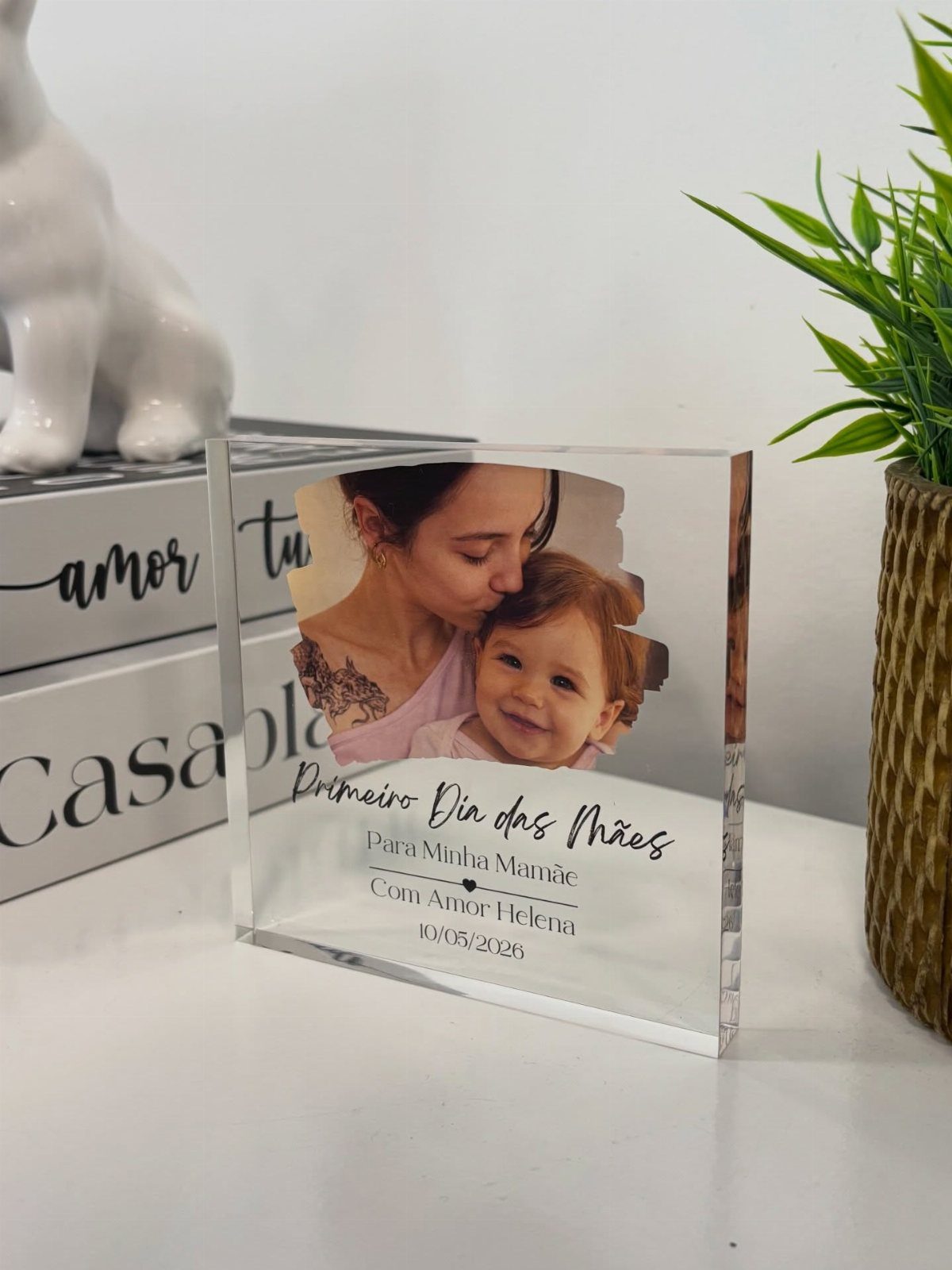 Acrylic block frame with a photo of a mother and baby and engraved text.