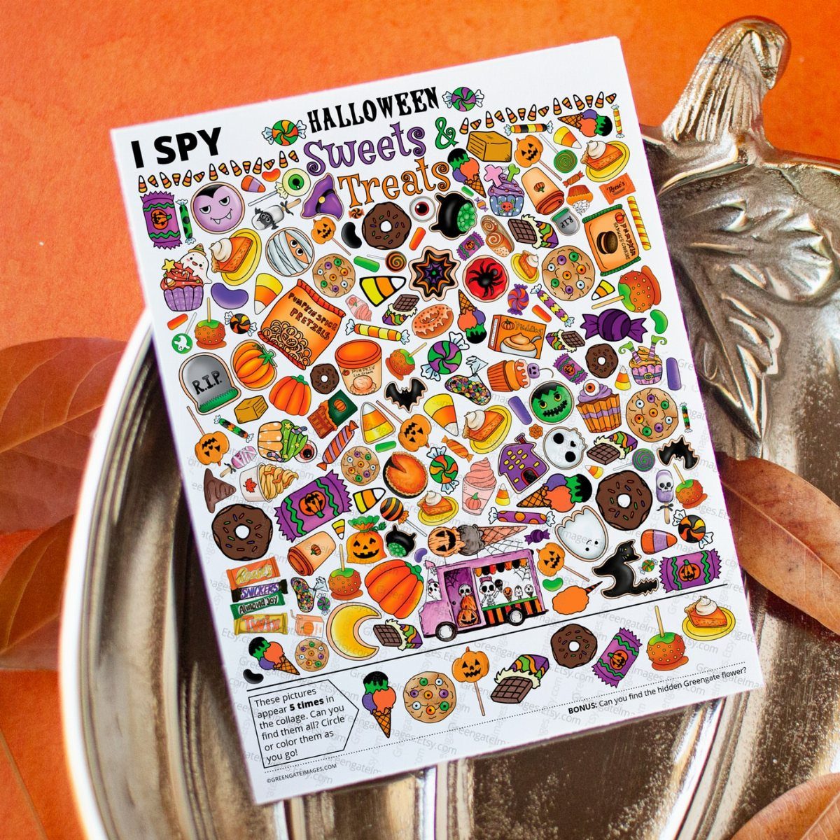 Halloween I Spy activity page with colorful candy illustrations on a silver platter