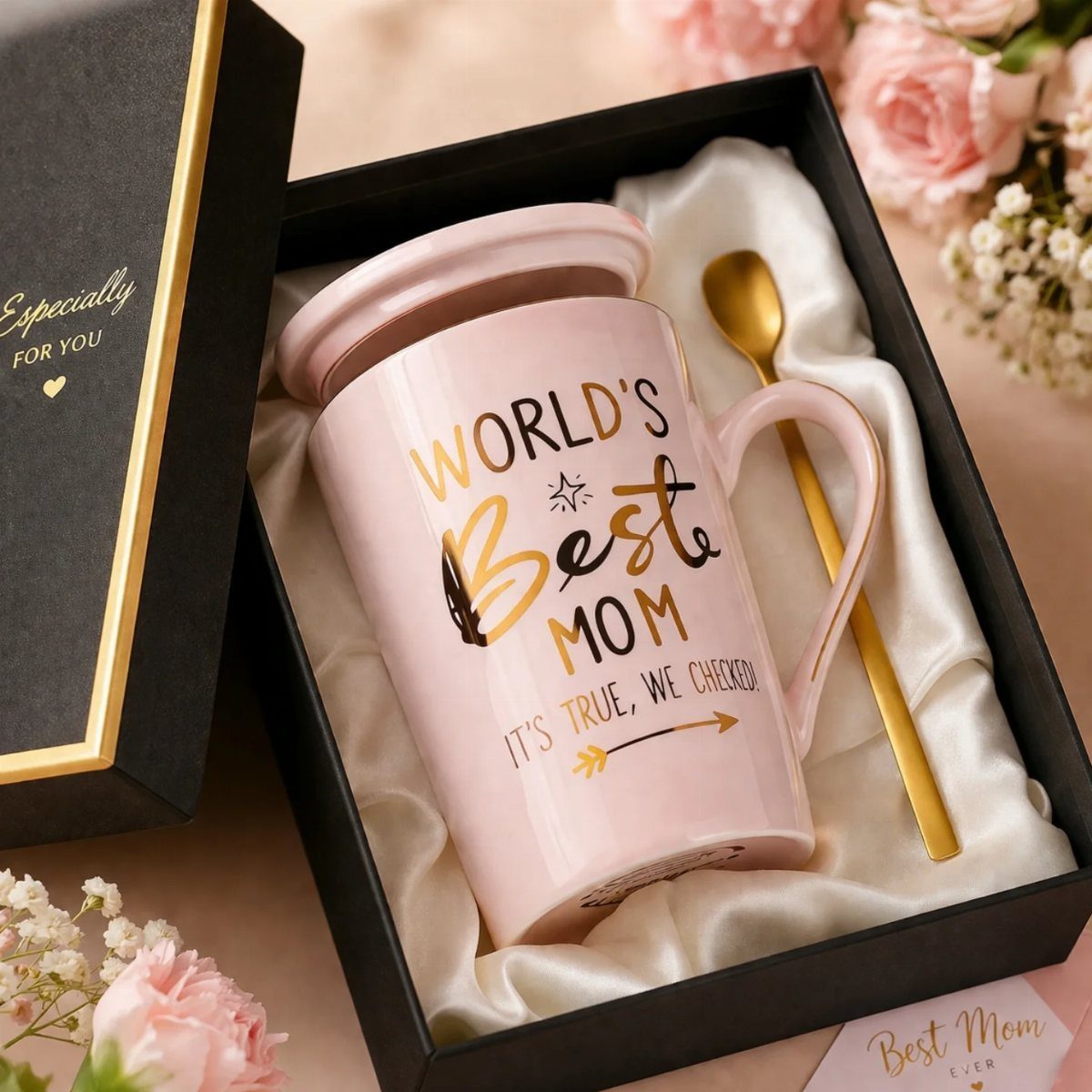 Pink World's Best Mom mug and gold spoon in a black gift box
