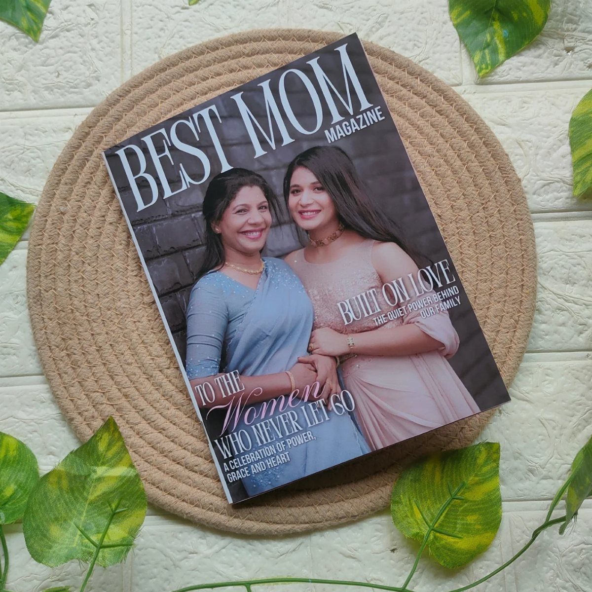 Best Mom Magazine featuring a mother and daughter on a woven mat.