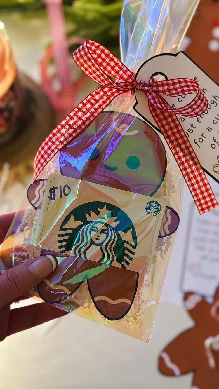 Starbucks gift card inside a gingerbread man cutout in a cellophane bag