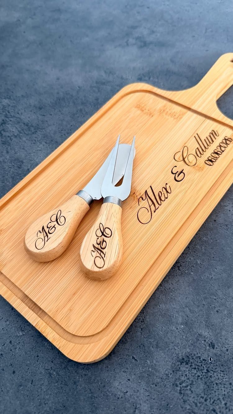 Engraved wooden cheese board and matching knives with names Alex and Callum