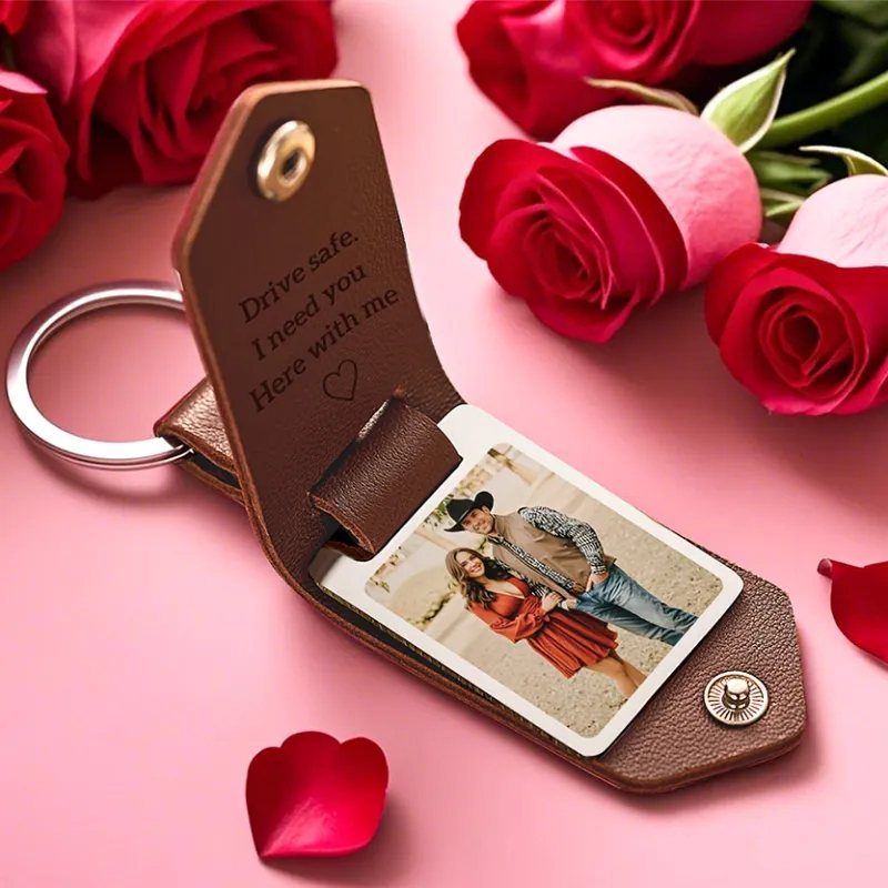 Brown leather personalized keychain with a couple's photo and engraved romantic message.