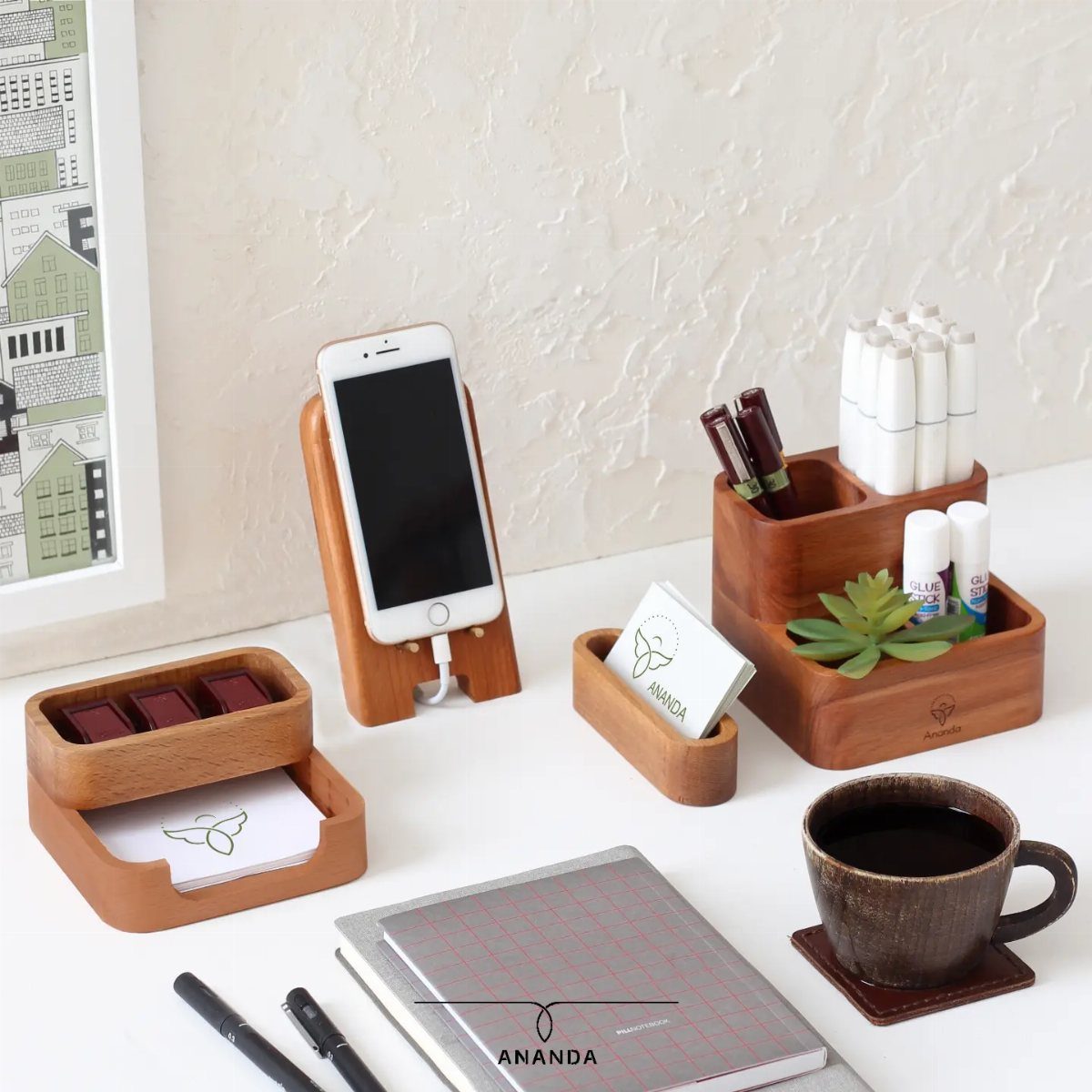 Wooden desk organizer set with phone stand, pen holder, and coffee cup.